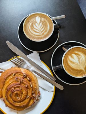 Banana and pecan bun. Oat flat whites. at HQ Urban Kitchen in Swansea