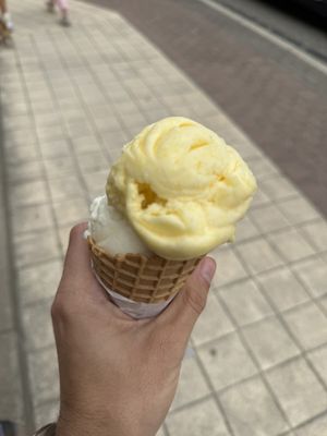 Mango and ananas ice cream in a waffle cone  at G&S Eiswelt in Sassnitz
