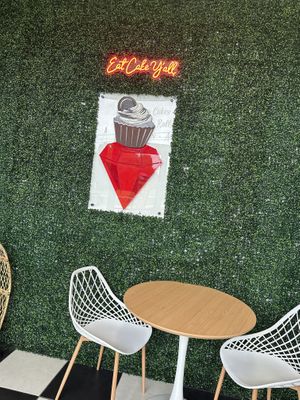 You heard her—eat cake! Very small eat-in table    at Ruby Baking Co in Rockwall