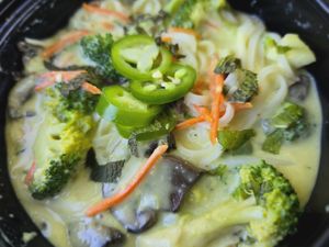 yellow curry - vegan and noodles with broccoli, carrot, mushroom, jalapeno, cilantro, and mint at Boom Noodles in Trinidad