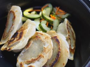 shiitake potstickers - mushroom and vegetable dumplings seared and steamed, served with cucumber salad and choice of dipping sauce (all are vegan: sweet chili, peanut, ponzu, and t at Boom Noodles in Trinidad