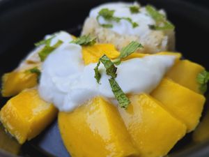 mango with coconut sticky rice at Boom Noodles in Trinidad