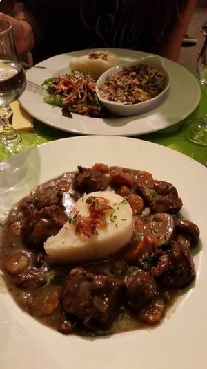 An a-ma-zing Seitan de Bourguignon and my partners dish (Cassoulet de la Mer.) at Le Potager du Marais - Saint Paul in Paris