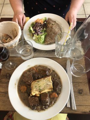 Seitan bourgignon with dauphinoise potatoes. Buckwheat pancakes stuffed with leeks.   at Le Potager du Marais - Saint Paul in Paris