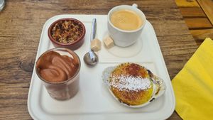 Café gourmand: crème brulée with apricots, chocolate mousse, crumble with red berries, coffee at Le Potager du Marais - Saint Paul in Paris