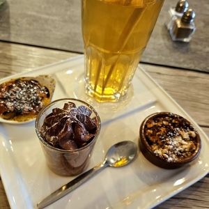 Cafe gourmand (with iced tea instead of coffee). Mini chocolate mousse, creme brulee, and berry crumble at Le Potager du Marais - Saint Paul in Paris