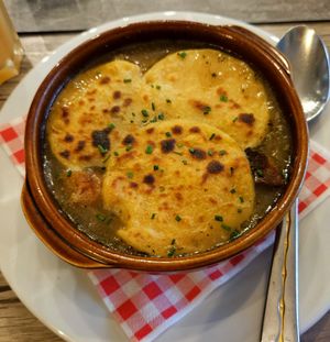 French onion soup! Don't miss it! at Le Potager du Marais - Saint Paul in Paris