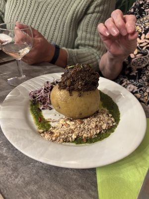 POMME DE TERRE RÔTIE, TAPENADE, PISTOU, GRAINES GERMEES, NOISETTES - definitely a baked potato, not a roast one!  at Le Potager du Marais - Saint Paul in Paris