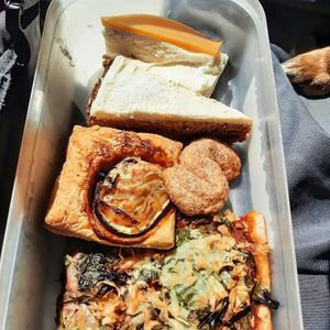 My take away: fluffy cheesecake, carrot cake, cinnamon cookie, pastry and salty pie with wild herbd. at Kahvila Helgas in Loviisa