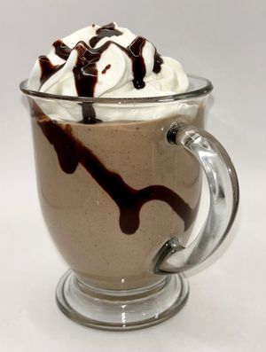 Coffee smoothie made with our cold brew, protein powder, banana, date and milk at Good Berry Cafe in Blue Ridge