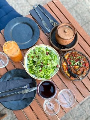 Spicy Georgian herb salad, freshly squeezed carrot-apple juice, Georgian ratatouille at Gastro Hub in Helsinki