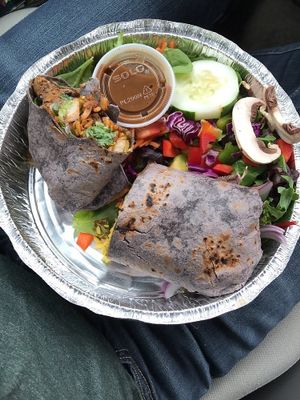 MUCH bigger than it looks. Vegan burrito to go at Cafe Con Leche in Newtown