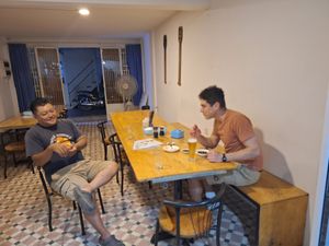 Sharing beer and sushi with the owner at Flowers Nanobrewery  in Phnom Penh