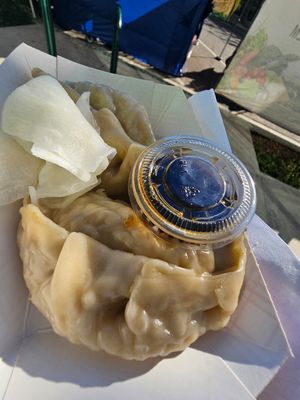 Steamed Mandu (Korean King Dumpling). All vegan and delish. 2 for $5 with a sample of their white kimchi. at Yuseong Mandu in San Diego
