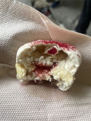 White chocolate strawberry macaron  at CAOS - O Futuro É Vegetal in Lisbon