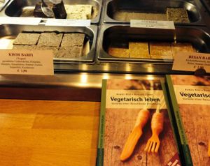 sweets at the counter & books for sale at Govardhan in Cologne