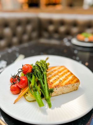 Our beautifully plated Tofu Steak — crisp on the outside, tender on the inside, and served with seasonal accompaniments that celebrate the art of vegan dining. at The Folio Bar & Kitchen  in Cambridge
