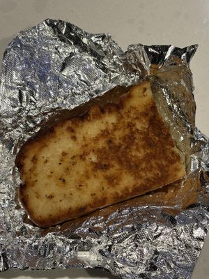 Slice of focaccia garlic bread   at The Loaded Bowl in Oklahoma City