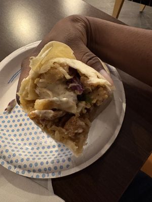 Close up of orange chicken wrap   at The Loaded Bowl in Oklahoma City