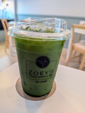 Iced matcha latte at Zoey's vegan by CANES in Bangkok