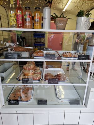 Five vegan doughnuts on offer. Delicious. I also got a latte with oat and my wife got one with soya. They also have coconut milk on offer too. at Holy Grounds in Preston