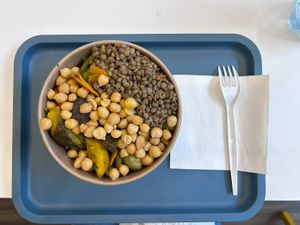 Bowl with rice, lentils, chickpeas and vegetables  at Bella Dentro Kitchen in Milan