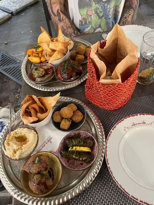 9 Mezze Mix with Falafel (2x), Potatoes, Hummus, Moussaka, stuffed vine leaves, Kibbeh, stuffed aubergine and aubergine creme at Le Mille e Una Notte in Trieste