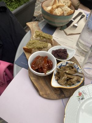 Crostini con paté di olive verdi, pomodori secchi, melanzane sott’olio e paté di olive nere   at Piattini Caffè & Vini in Turin
