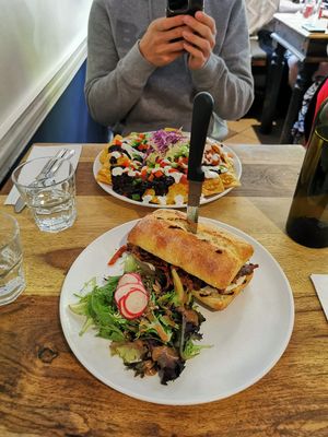 Cheesesteak sandwich and nachos at Lola Rosa - Milton in Montreal
