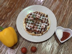 Tempeh pizza   at Mai3 Cafegan Vegetarian Cafe in Kuta