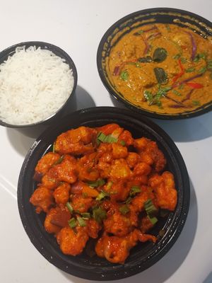 Vegan Chilli Ghobi (front), Soya Champ Masala (back), and rice. at Golden Spoon Vegetarian Restaurant in Abu Dhabi