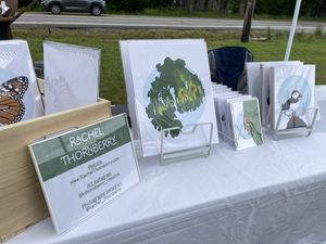 Local print maker  at MDI Community Market in Bar Harbor