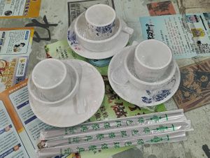 very hygienic. utensils are covered with plastics at Cái Wō Wō Bèn Gōngjī Sichuan Restaurant - 财窝窝笨公鸡川菜馆 in Tekes County