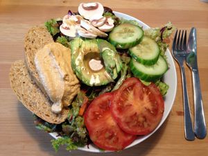 salad with avocado and hummus at HappenPappen in Hamburg