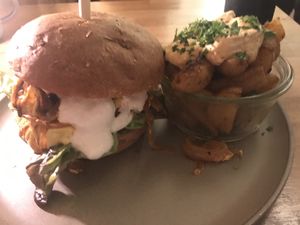 Cheese burger with oven fries and harissa sauce  at HappenPappen in Hamburg