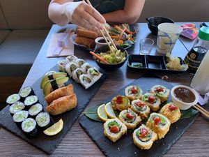 Front: Vegetable Sushi Platter, Angry Tofu Roll, teriyaki sauce
Back: side salad, teriyaki vegetable plate at Hooked On Sushi in San Marcos