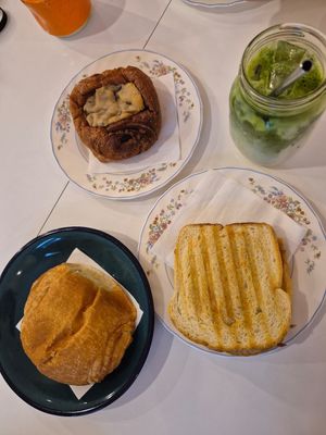 Iced matcha, philly sandwich, 2 varieties of chocolate roll at Café Mila  in Quebec