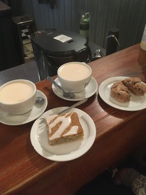 Vegan chai latte (homemade coconut-almond milk), lemon-poppy seeds cake and raspberry-chocolate scone (not vegan)   at Pourquoi Pas Espresso Bar in Montreal