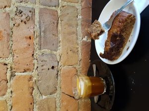 Perfect for a rainy morning. Machiato & Banana-choco cake! at Pourquoi Pas Espresso Bar in Montreal