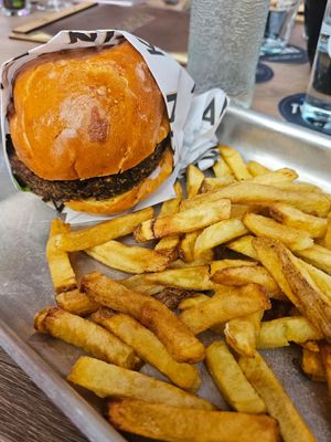 Vegan mushroom burger with fries at KANTIN in Dudelange