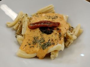 Pasta in an almond, sundried tomato sauce at La Mandragora in Valencia