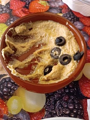 Sauce with olive at La Mandragora in Valencia