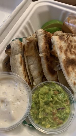 Quesadillas, with protein options: Impossible Chorizo, Carne Asada, and Seitan Carnitas, comes with made in house guacamole and tofu cream!  at Taqueria Vegana  in Toronto