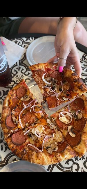 AMAZING pizza!! Both the regular and gf (cauliflower) crust are vegan. They also have vegan mozzarella, pepperoni, and chorizo, in addition to endless vegetable toppings.  at Bliss Beach in Daytona Beach Shores