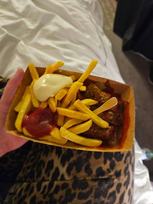 Vegan currywurst with fries, tomato and vegan truffle mayo at CURRY 61  in Berlin