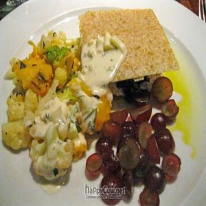 Spanakopita With Spinach, Almond Feta, Cucumber Yogurt local cauliflower and white grapes. at Pure Food and Wine in New York City