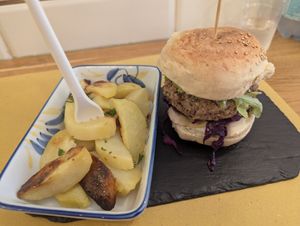 Burger and potatoes at Malerba in Bologna