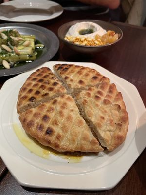 Koji flatbread, smoked mushroom chilli ragu  at Holy Carrot in West London