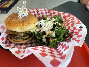 Mexican Romeo burger with side kale salad.  at Romeo's in Asheville