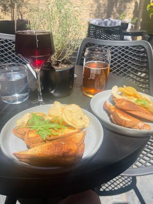 Marinated mushroom mix with zucchini and vegan cheese toastie, and caramelised onion and vegan cheese toastie, side of truffle crisps 😍 at Manifold & Co in Hawthorn